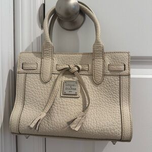 Dooney & Bourke Cream Satchel with Tassel Detail
